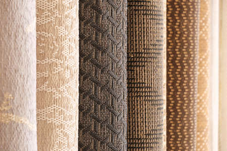 Many different carpets in shop