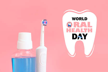 Tooth brushes and mouth rinse on color background. World Oral Health Dayの写真素材