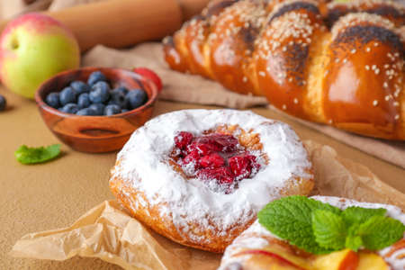 Sweet pastry on color background