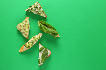 Different tasty sandwiches on color backgroundの写真素材