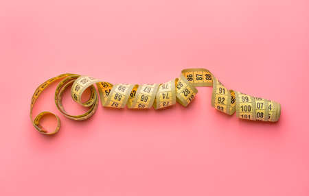 Measuring tape on color backgroundの写真素材