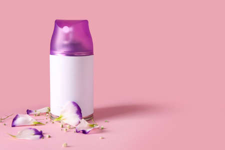 Bottle of air freshener on color backgroundの写真素材
