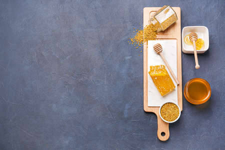 Composition with sweet honey on table