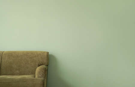 Cozy sofa on color backgroundの写真素材