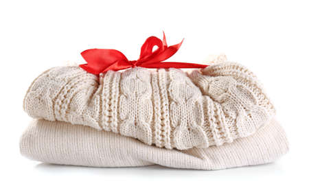 Warm Christmas clothes on white backgroundの写真素材