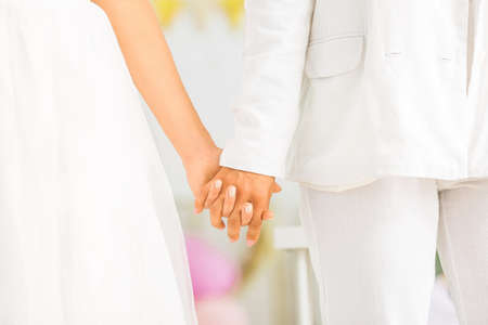 Beautiful lesbian couple during wedding ceremony, closeupの写真素材