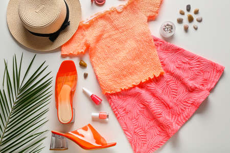 Summer composition with female clothes and accessories on light backgroundの写真素材