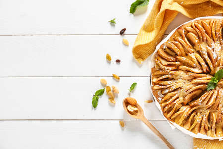 Sweet apple pie on wooden tableの写真素材