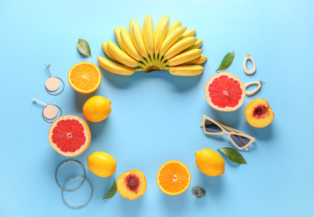 Summer composition with tropical fruits and female accessories on color backgroundの写真素材