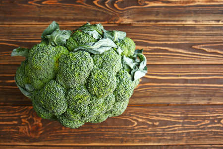 Fresh broccoli cabbage on wooden backgroundの写真素材