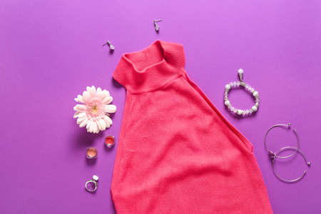 Modern female look with stylish accessories on color backgroundの写真素材