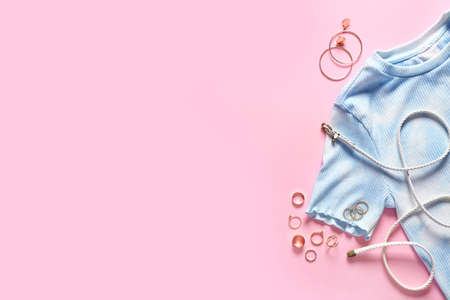 Modern female look with stylish accessories on color backgroundの写真素材