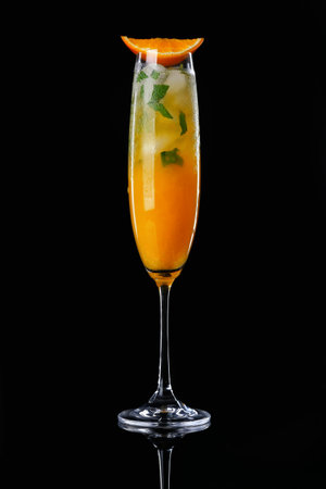 Glass of tasty cocktail on dark backgroundの写真素材