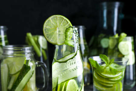 Bottle of healthy infused water on table, closeupの写真素材