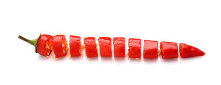 Cut chili pepper on white background