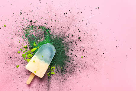 Tasty spirulina ice-cream on color background