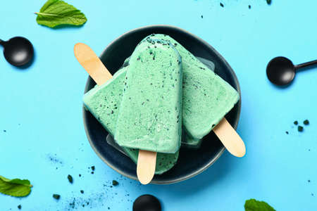 Composition with tasty spirulina ice-cream on color backgroundの写真素材