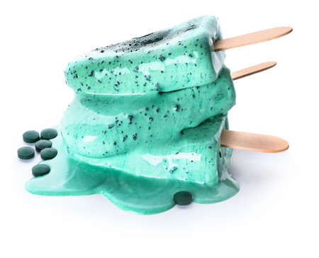 Tasty spirulina ice-cream on white background