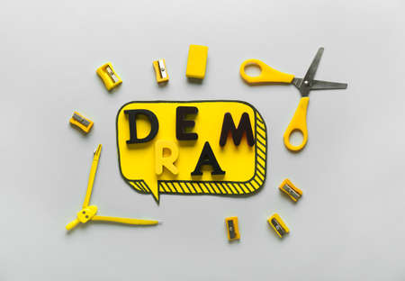 Word DREAM and stationery on light backgroundの写真素材