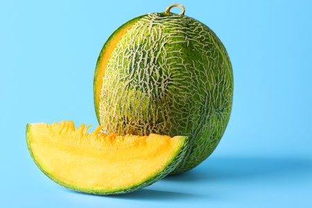 Sweet ripe melon on color backgroundの写真素材