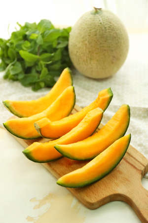 Sweet cut melon on table