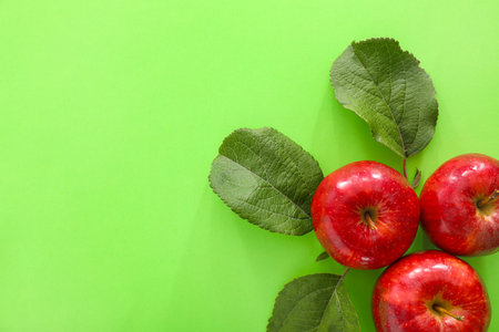 Ripe apples on color background