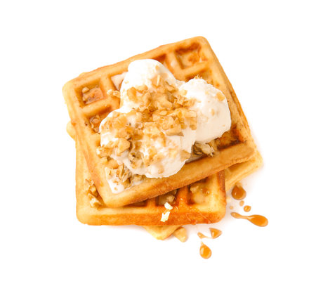 Tasty waffles and ice-cream on white backgroundの写真素材