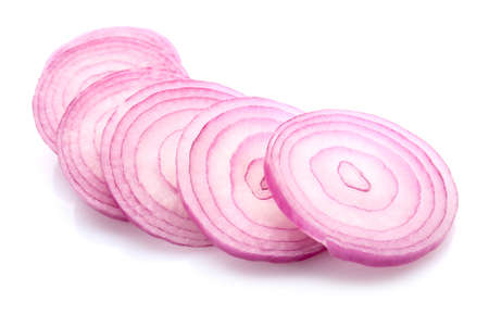 Slices of raw onion on white backgroundの写真素材