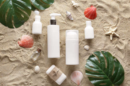 Cosmetics for personal hygiene on beach sandの写真素材