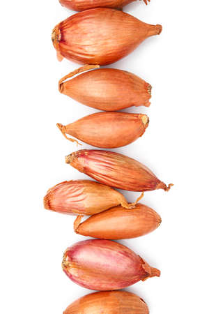 Fresh raw onions on white backgroundの写真素材