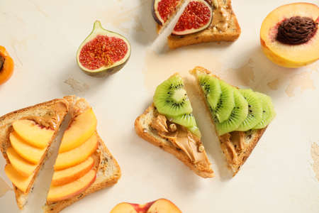 Tasty sweet sandwiches on white background