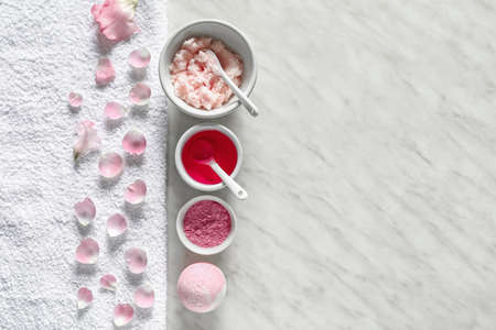 Composition with cosmetics for spa procedures on light background