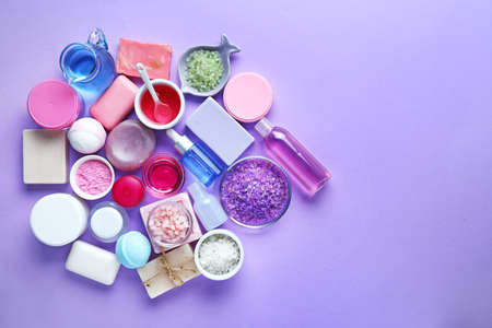 Composition with cosmetics for spa procedures on color background