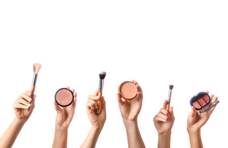 Many hands with decorative cosmetics on white backgroundの写真素材
