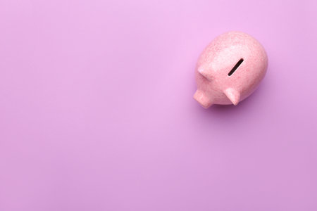 Piggy bank on color backgroundの写真素材
