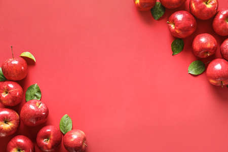 Fresh ripe apples on color backgroundの写真素材