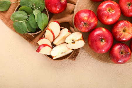 Fresh ripe apples on color backgroundの写真素材