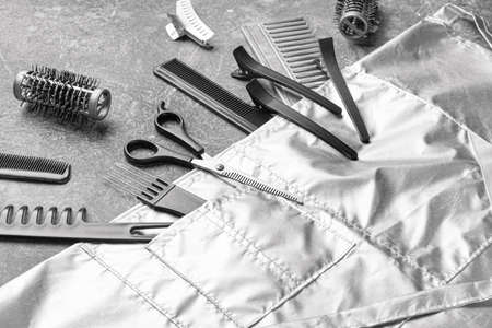 Set of hairdresser tools and accessories on gray backgroundの写真素材