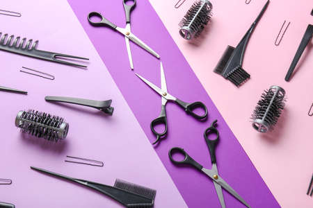 Set of hairdresser tools on color backgroundの写真素材