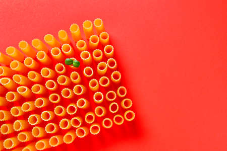 Dry pasta on color background