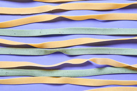 Dry pasta on color background