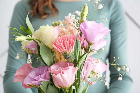 Woman with bouquet of beautiful flowers, closeupの写真素材