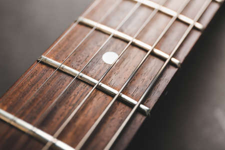 Modern acoustic guitar closeup viewの写真素材