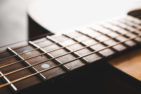 Modern acoustic guitar closeup viewの写真素材