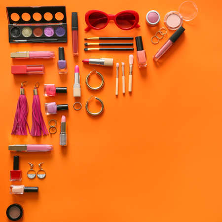 Set of decorative cosmetics and accessories on color backgroundの写真素材