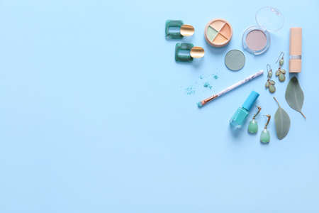 Set of decorative cosmetics and accessories on color backgroundの写真素材