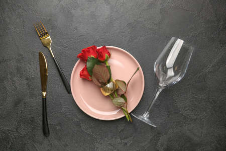 Beautiful table setting on dark backgroundの写真素材