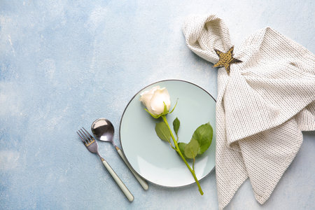 Beautiful table setting on color backgroundの写真素材