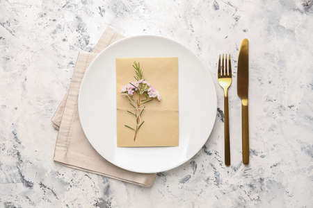 Beautiful table setting on light backgroundの写真素材