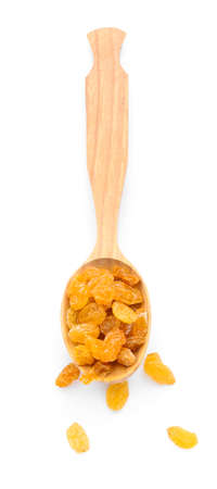 Spoon with raisins on white backgroundの写真素材